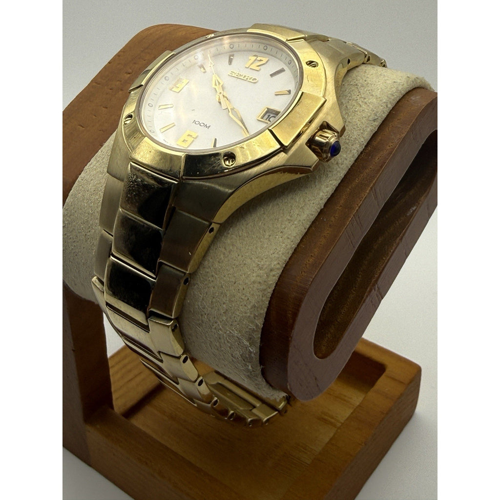 Seiko 7N42-0GE0 Gold Tone Quartz Watch Silver Sunburst Dial 100M Cabochon Crown